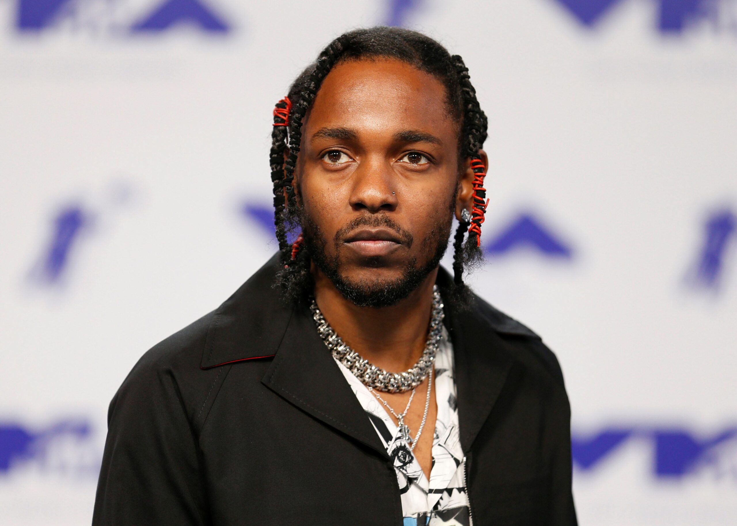 FILE PHOTO: Musician Kendrick Lamar arrives at the 2017 MTV Video Music Awards in Inglewood