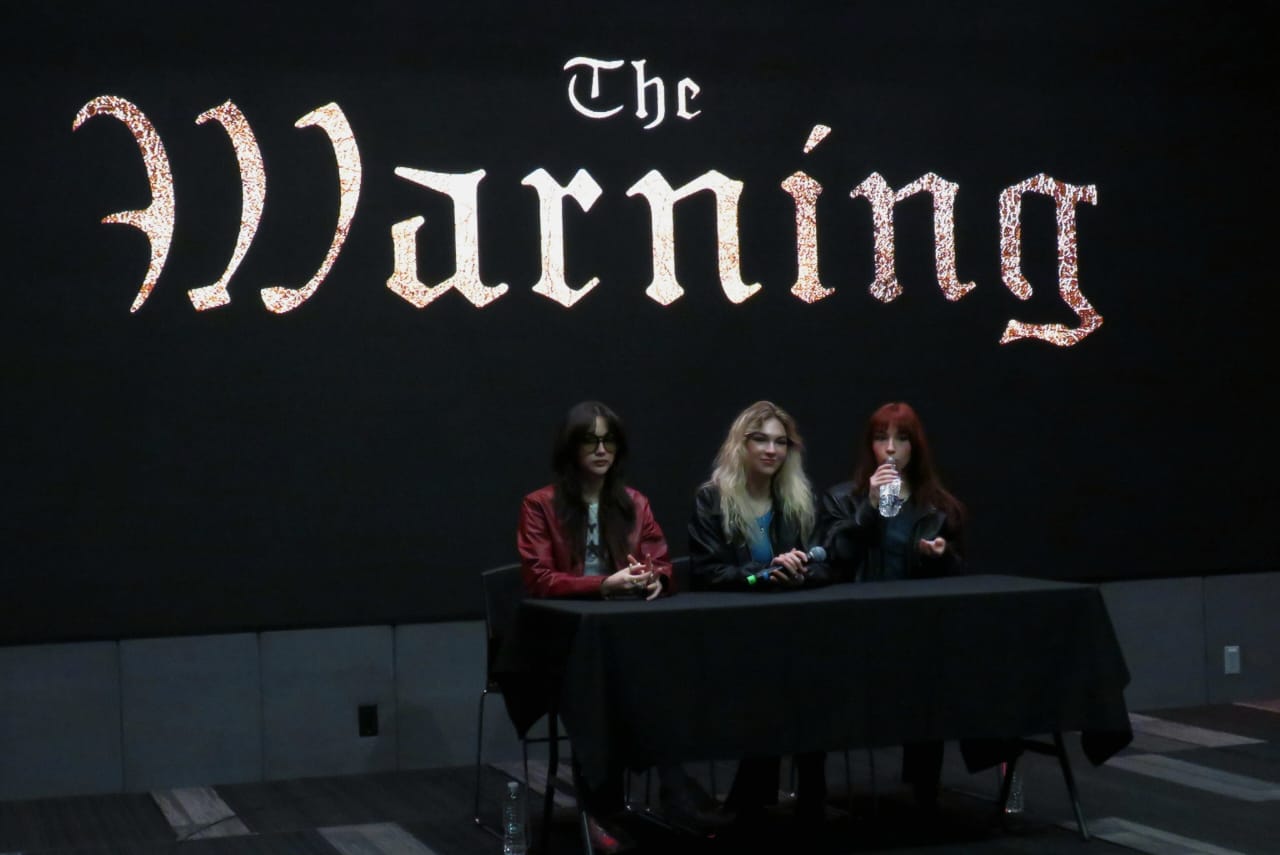 THE WARNING CONFERENCIA